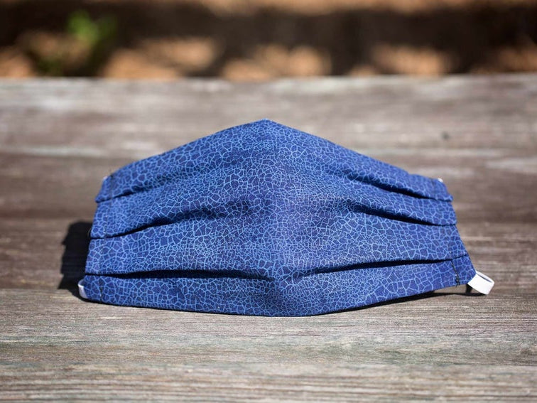 How to clean your fabric face mask between trips to the store for esse