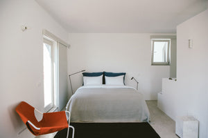 Remodelista Reconnaissance: A Bright Brazilian Chair in a Minimal Escape