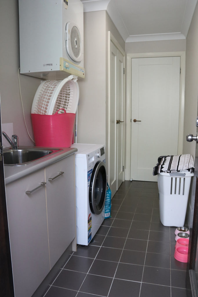 Laundry ideas: A tired space becomes practical & luxe